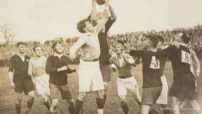 Men jumping for a football during a game