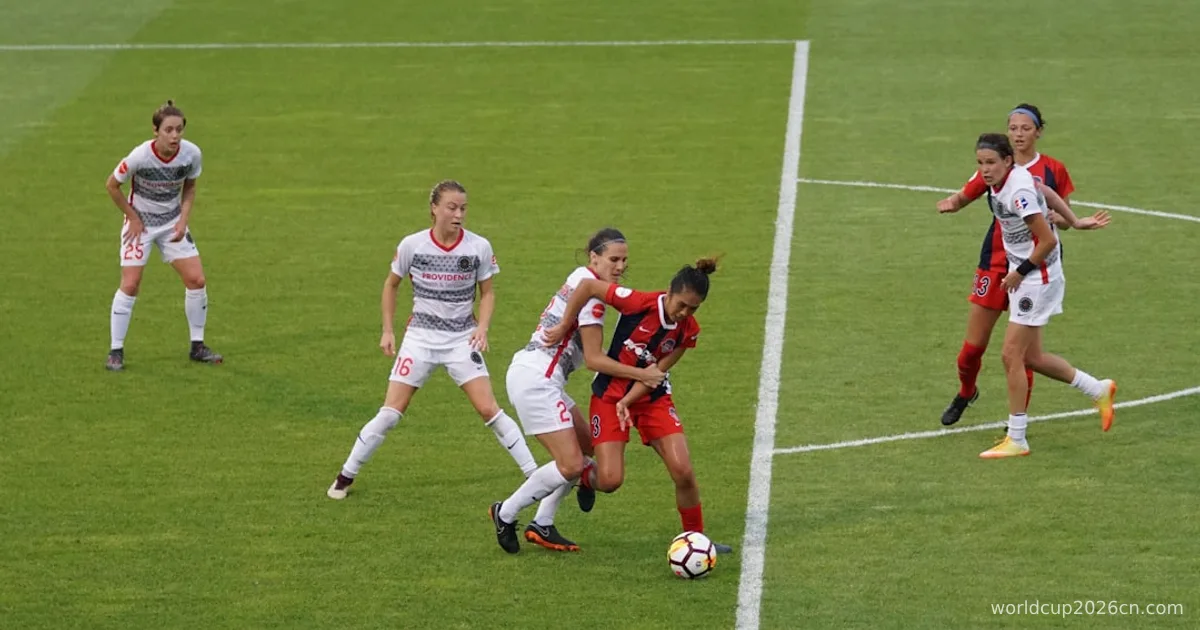 group of females playing soccer