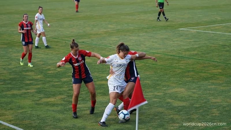 group of women playing soccer