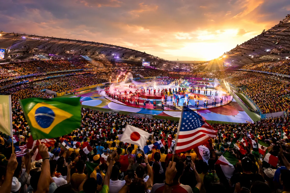 Vibrant world cup opening ceremony atmosphere, colorful stage in a large football stadium,